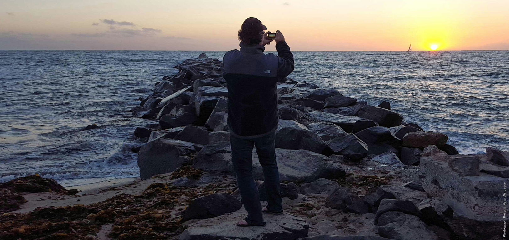Philip Warbasse taking pictures of the ocean